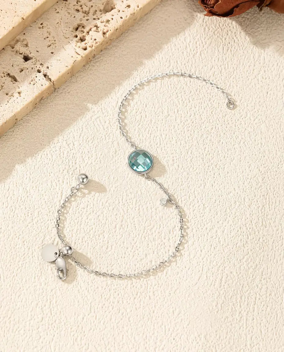 Armband met blauwe zirkonia - 8 mm schaakbordslijpsel aan jasseron met schuifsluiting, 925 sterling zilver