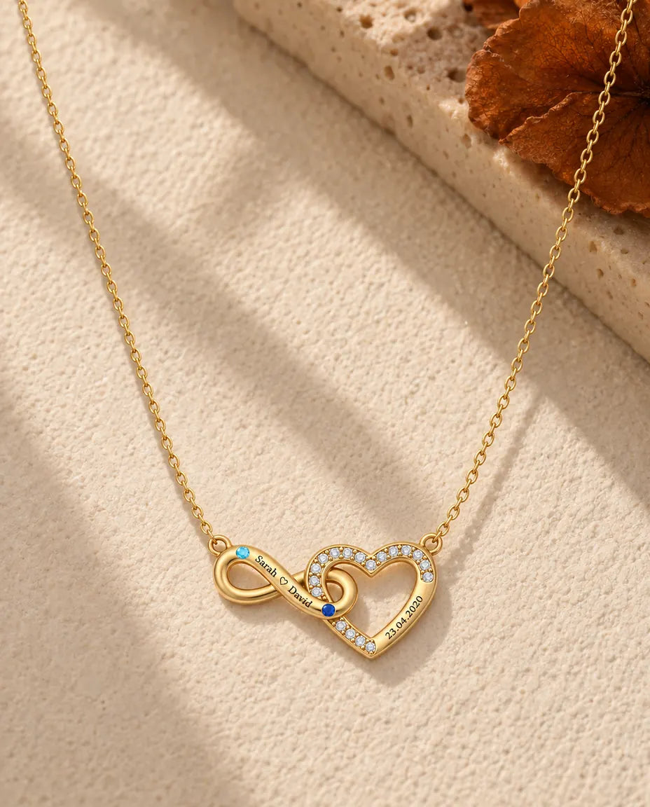 Gepersonaliseerde Ketting met 2 Namen en Datum - gouden oneindig hart met twee geboortestenen