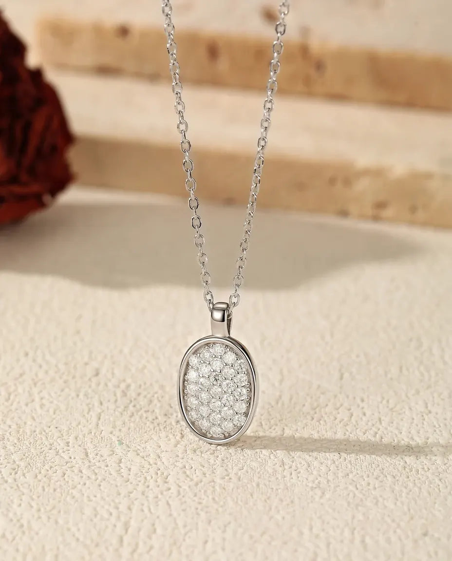 Moissanite Ketting Ovaal in Pavé – 29 stenen kleur D VVS1, hanger 10 x 13 mm in 925 sterling zilver