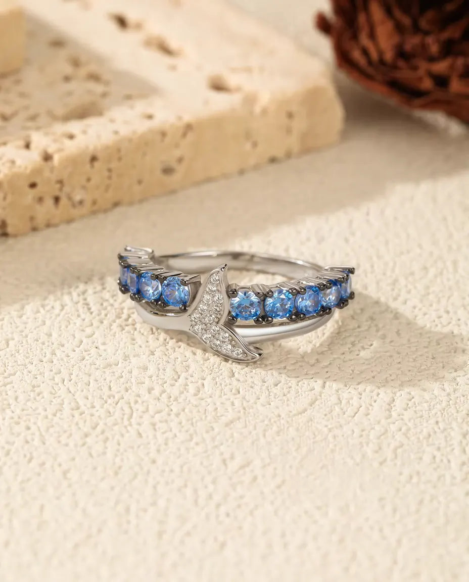 Walvisstaart Ring - blauwe en witte zirkonia op gekruiste band, maten 5 tot 9, 925 sterling zilver