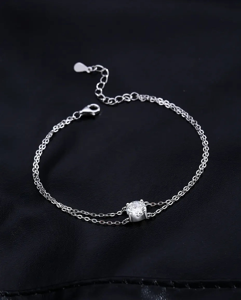 Dubbele armband met moissaniet van 1 ct – 925 sterling zilver, twee fijne schakels, ronde steen kleur D