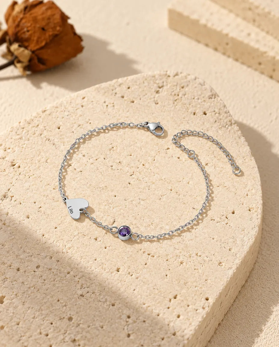 Armband met één naam: één gegraveerd hartje en een paarse geboortesteen