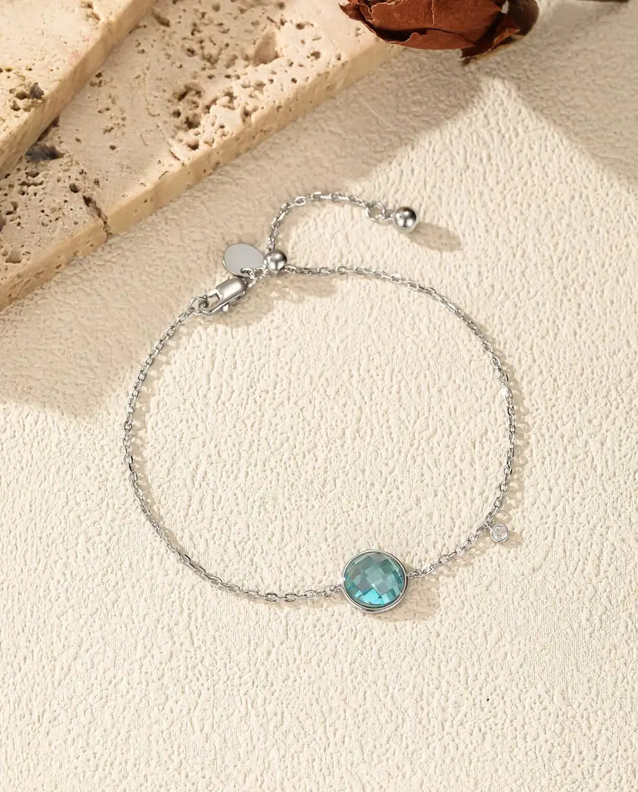 Armband met blauwe zirkonia - 8 mm schaakbordslijpsel aan jasseron met schuifsluiting, 925 sterling zilver