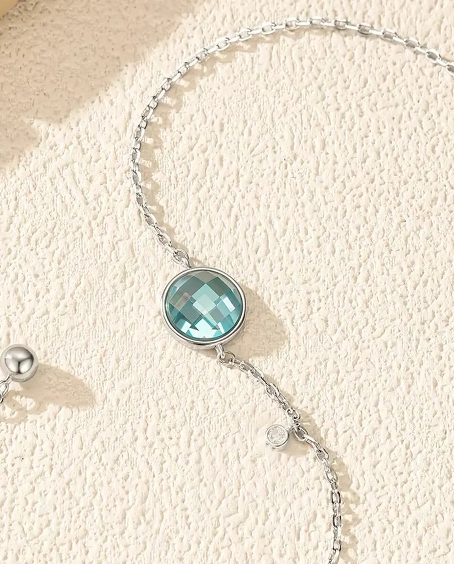 Armband met blauwe zirkonia - 8 mm schaakbordslijpsel aan jasseron met schuifsluiting, 925 sterling zilver