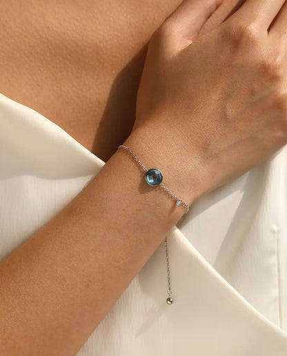 Armband met blauwe zirkonia - 8 mm schaakbordslijpsel aan jasseron met schuifsluiting, 925 sterling zilver