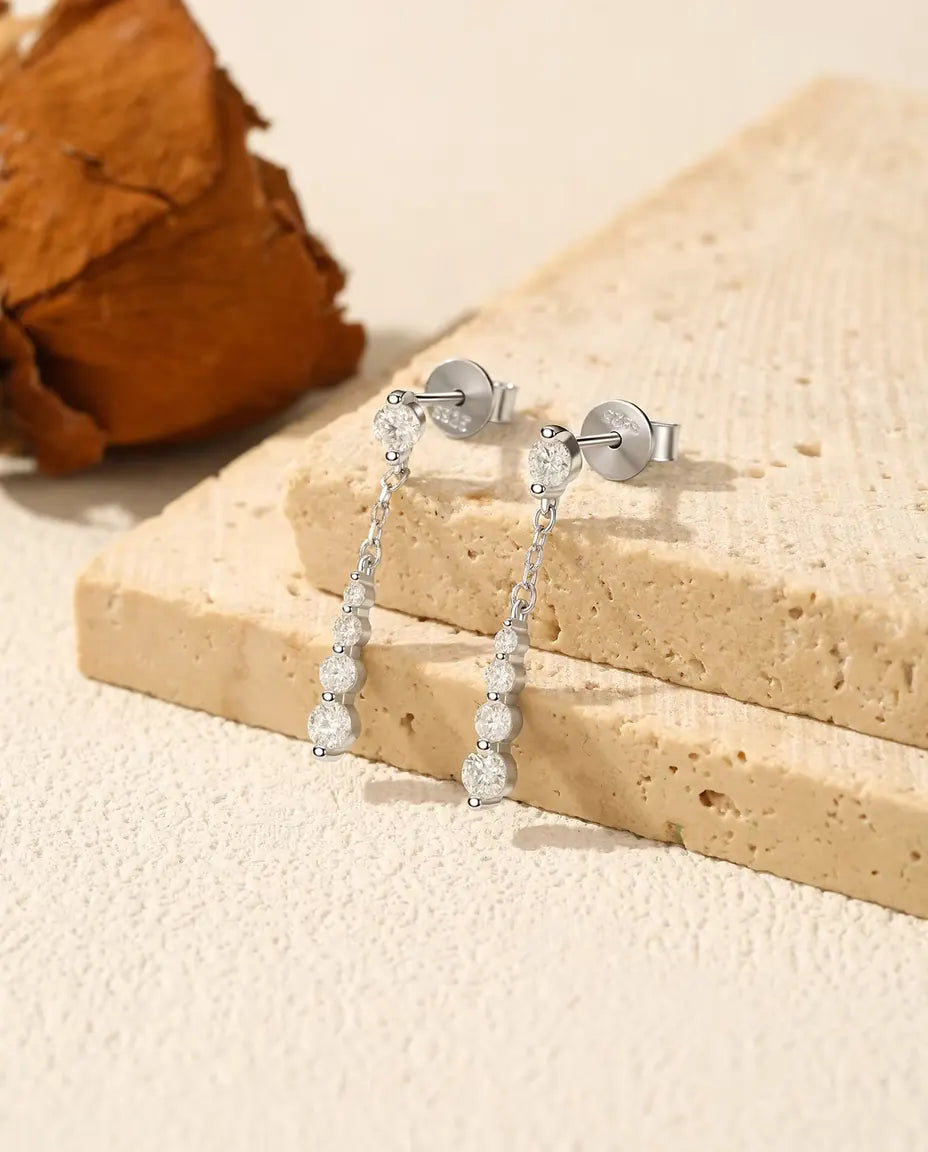 Moissanite oorbellen aan ketting – tien stenen kleur D oplopend van 1,5 naar 3 mm, 925 zilver, 24 mm