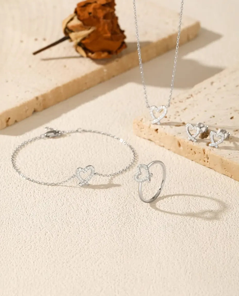 Moissanite sieradenset met open hart in 925 sterling zilver: ketting, armband, ring en oorknopjes