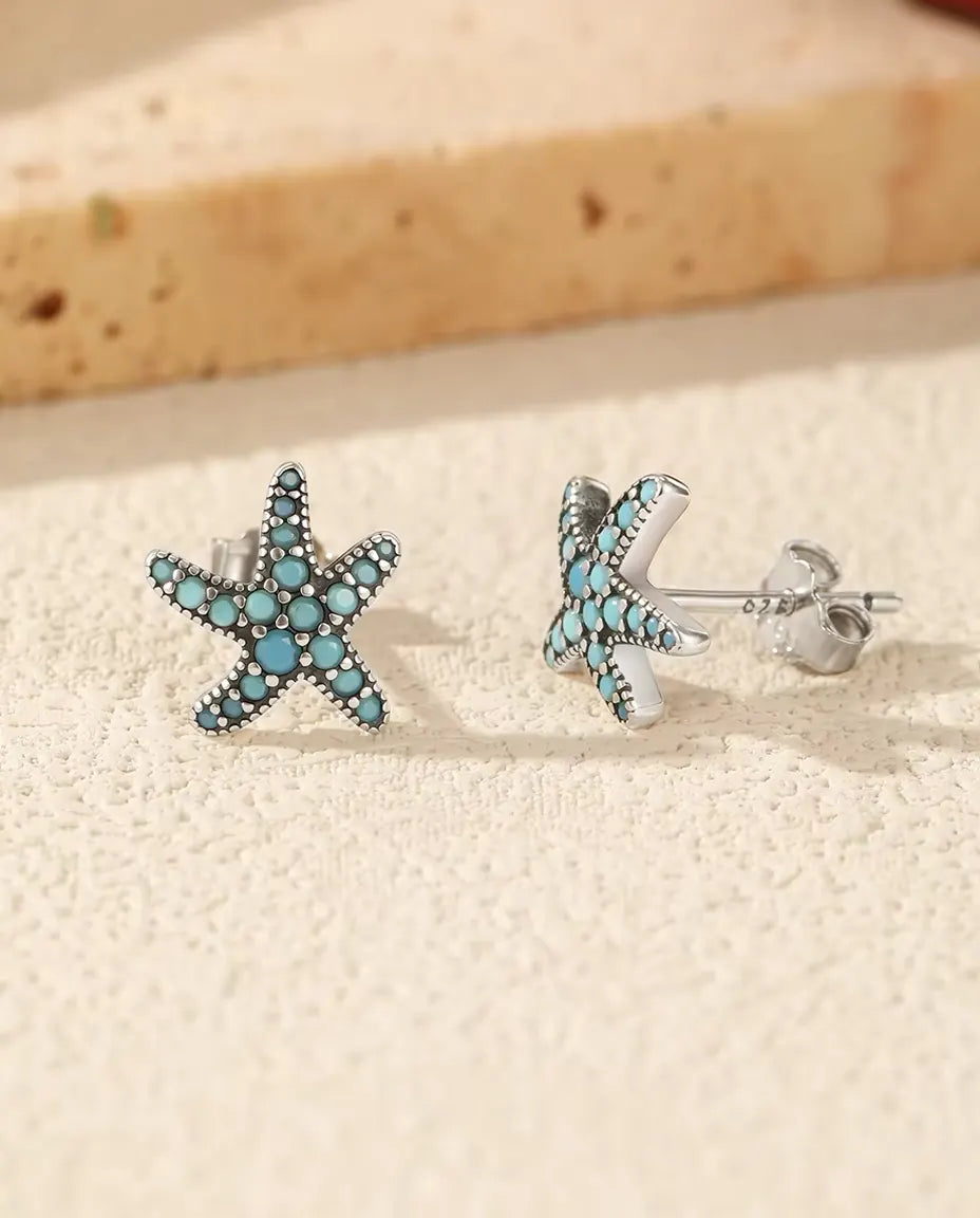 Zeester Oorstekers met Turkoois - 10 mm in geoxideerd 925 sterling zilver met turkooisblauw pavé