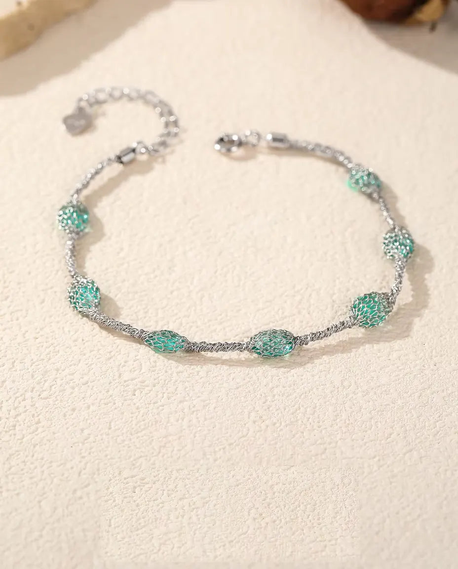Zirkonia Armband in 925 Sterling Zilver - plat op een licht gestructureerd oppervlak met sluiting en verlengketting