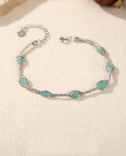 Zirkonia Armband in 925 Sterling Zilver - plat op een licht gestructureerd oppervlak met sluiting en verlengketting