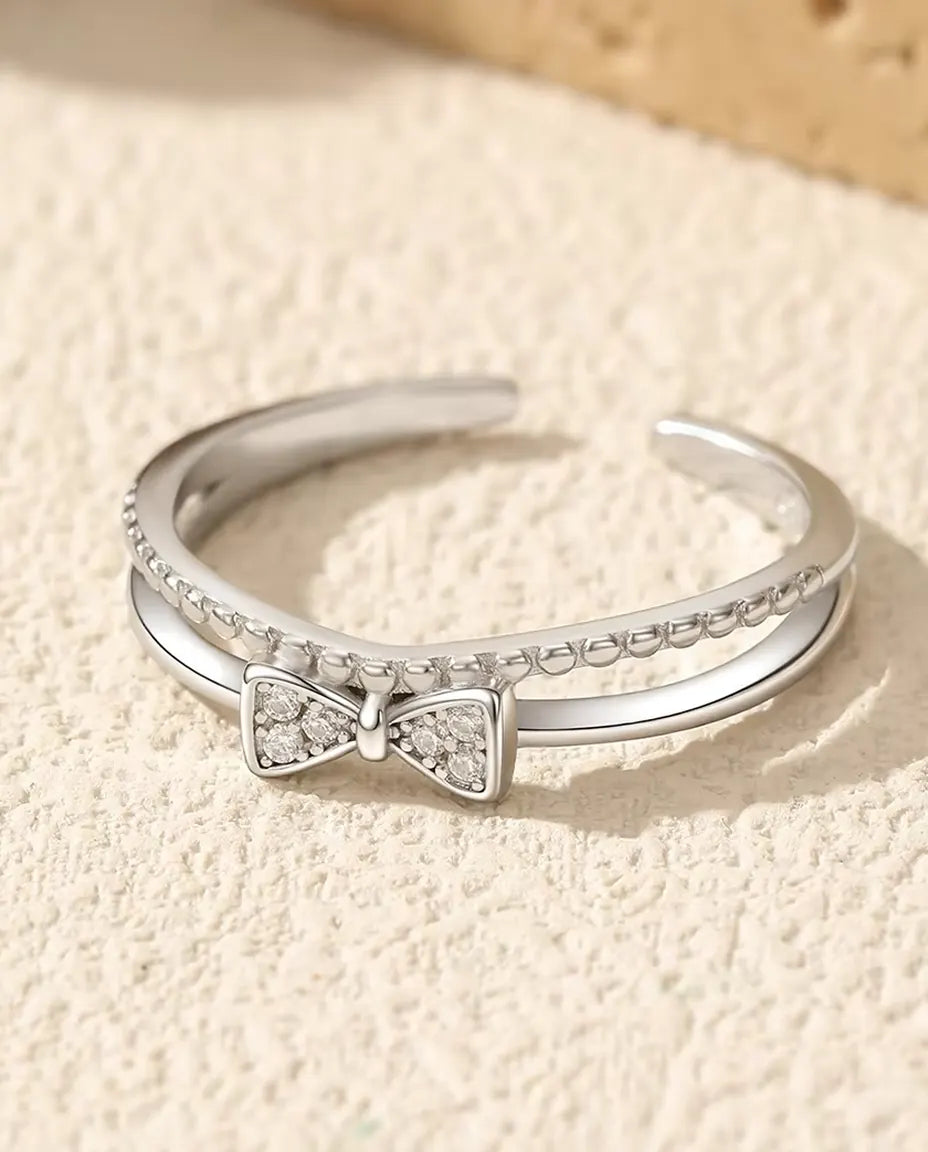 Zirkonia strik ring - pavé strik van 3,5 x 7 mm op een dubbele band met gepareld draad, verstelbaar, 925 sterling zilver, US 6 t/m 9
